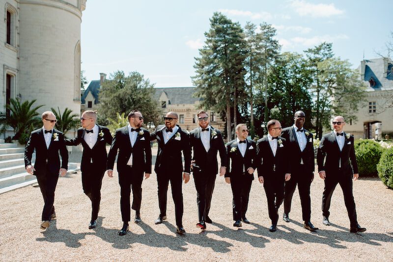 Groom and the guests at a destination wedding in France